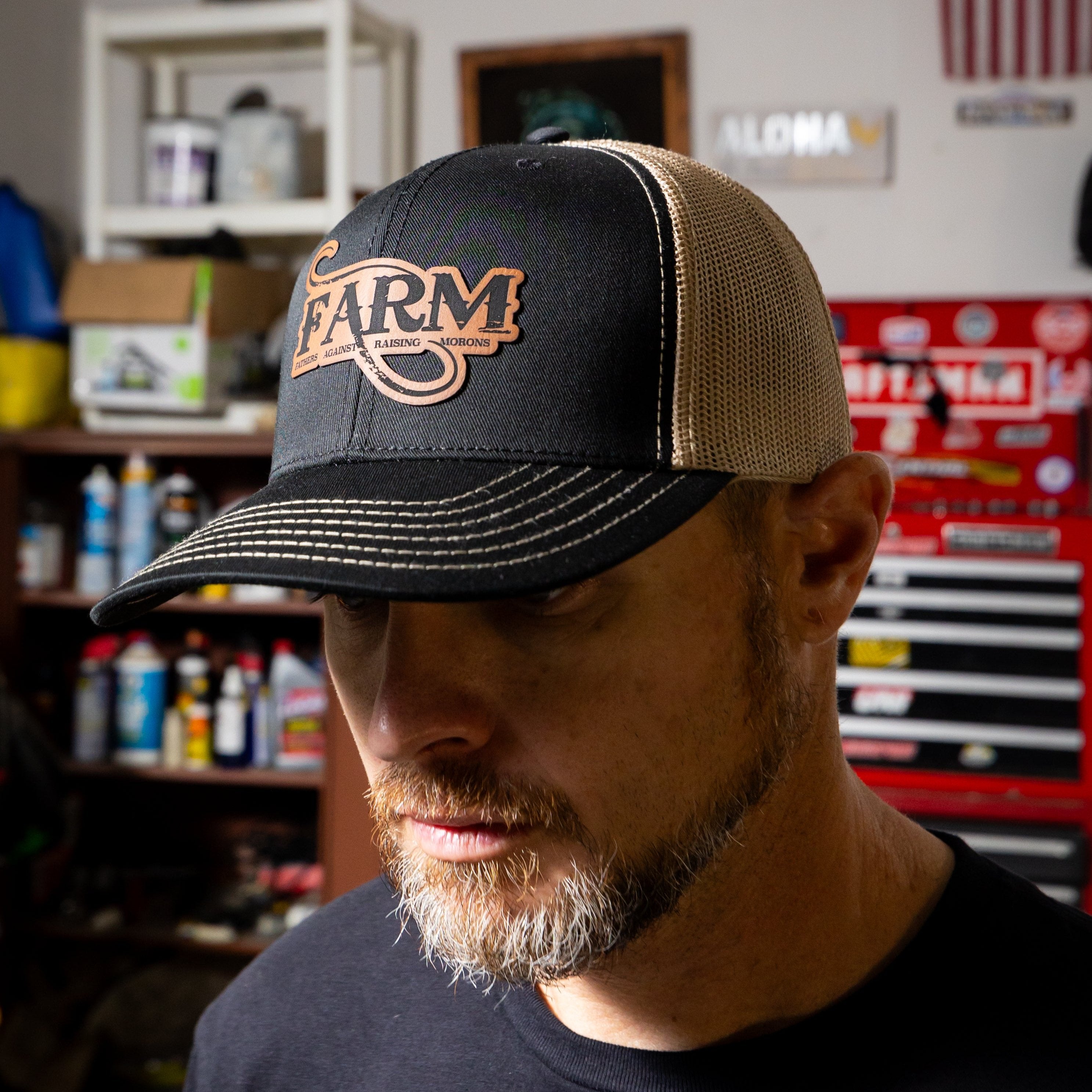black and gold farm leather patch hat side view