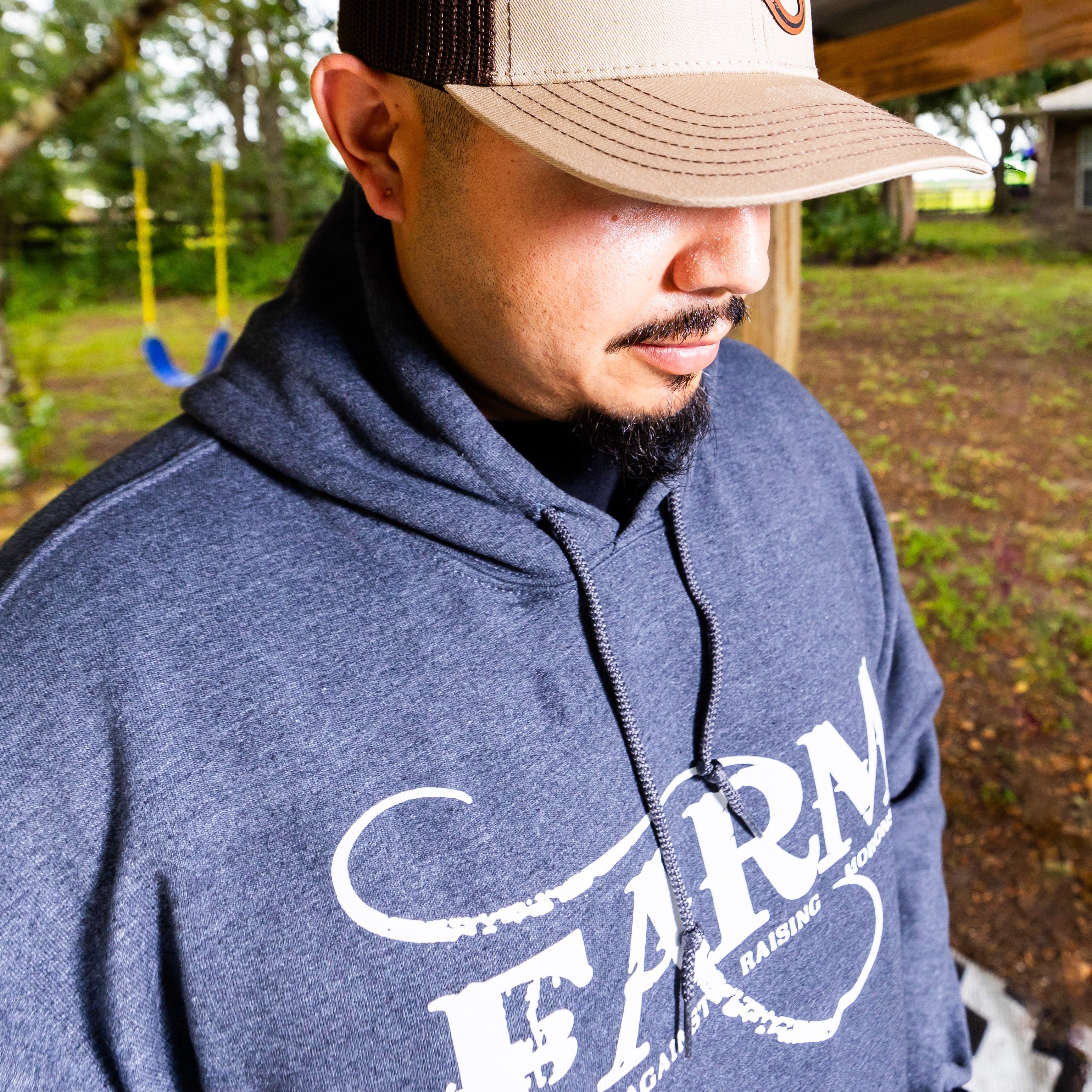 farm heather grey hoodie josh modeling side view